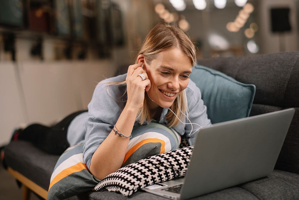 Person-watching-financial-wellbeing-webinars_12.25 Person watching financial wellbeing webinars