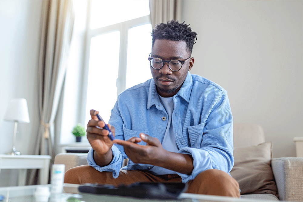 Man taking diabetes reading