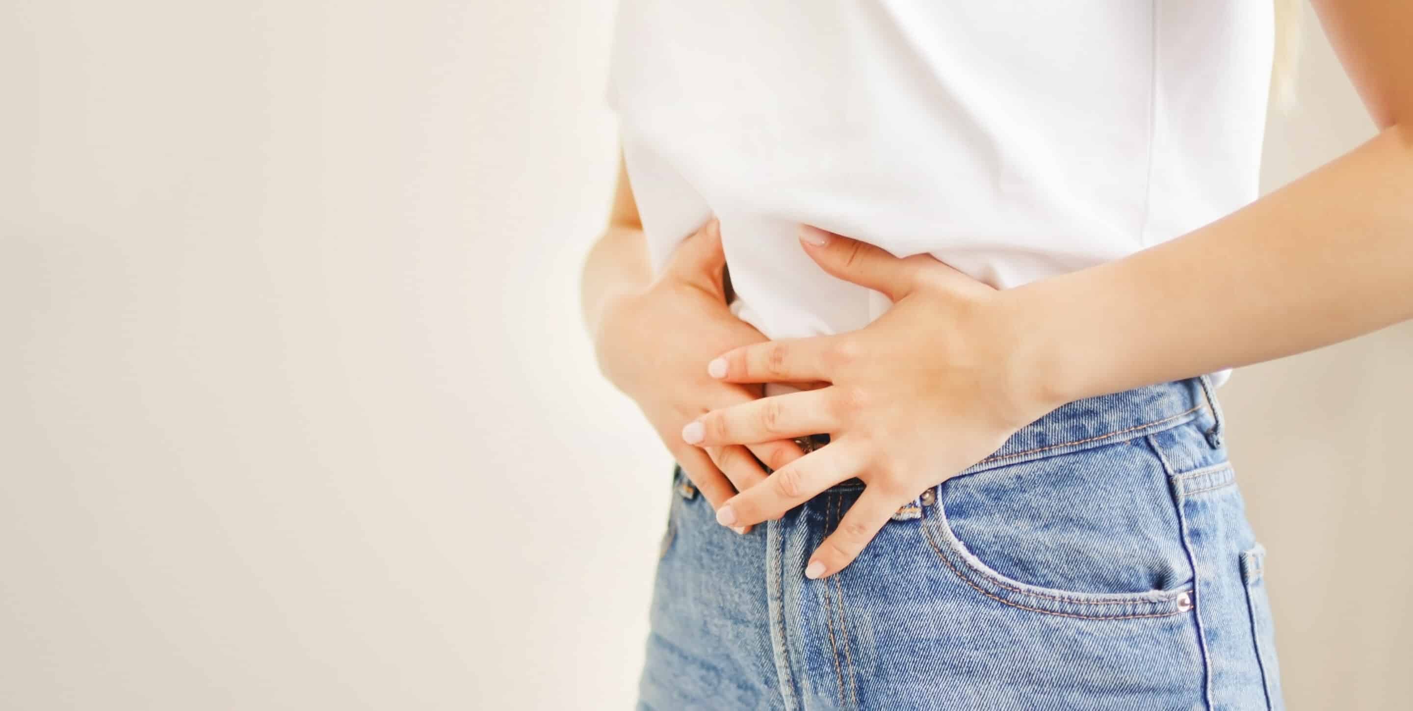 Menstrual wellbeing Hands holding stomach